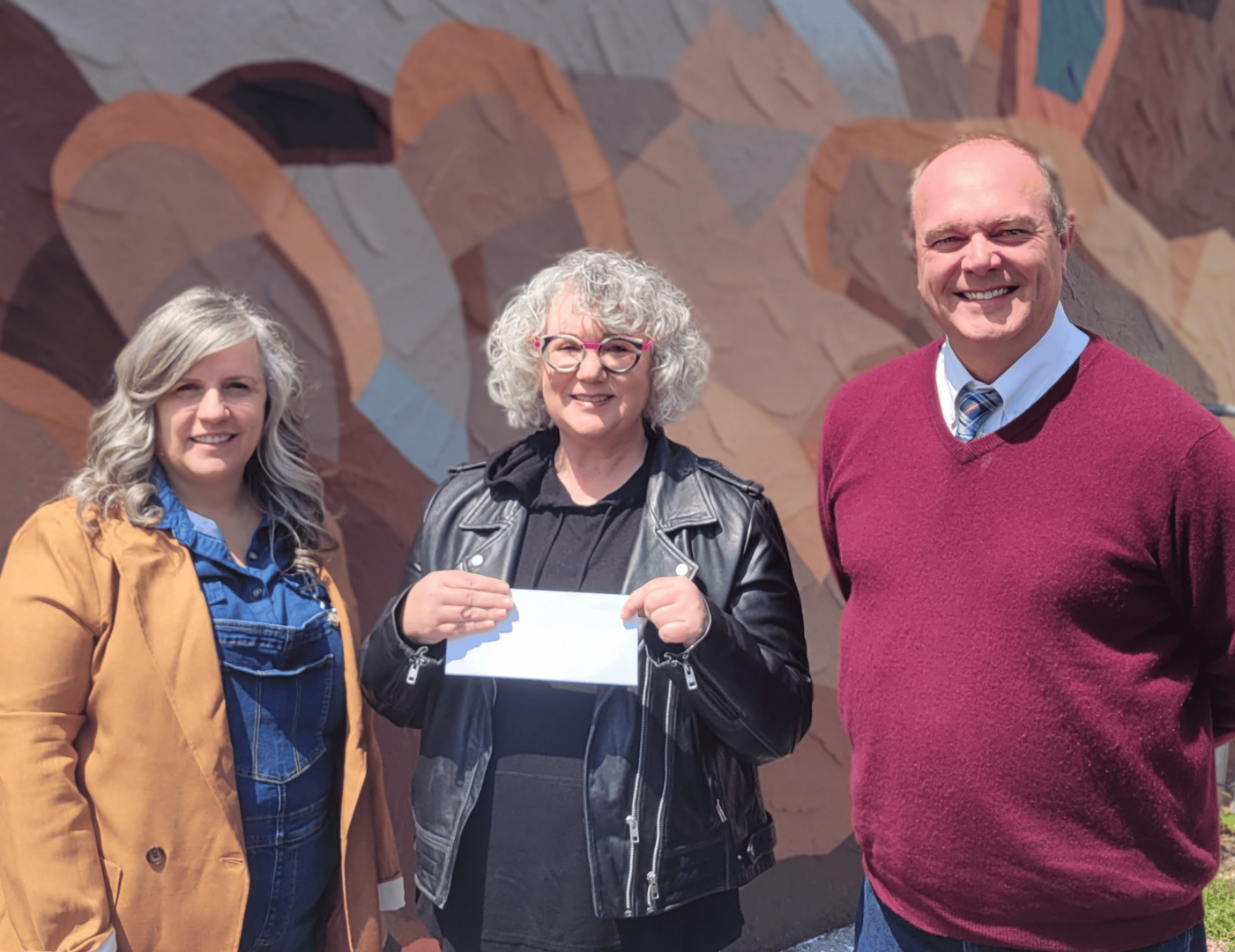 Better Than Bacon Improvasation group donates money to Friends Association