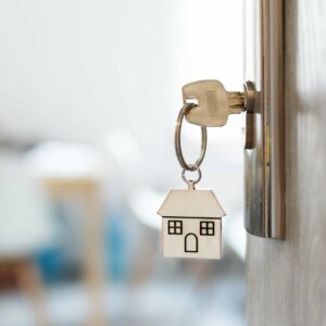 key in door with house keyring